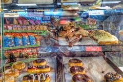 Donuts and Mexican conchas in a mini mart.