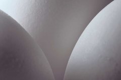 Close graphic shot of three white eggs.
