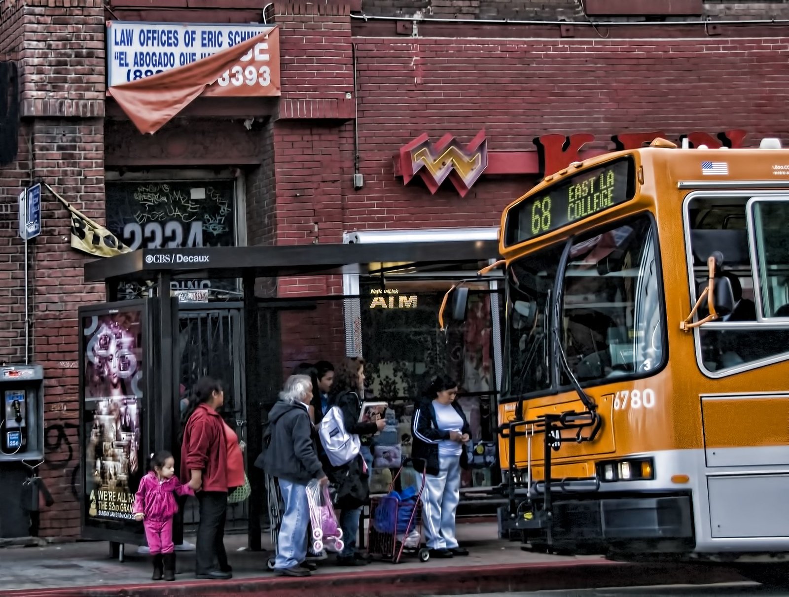 People get on an LA bus